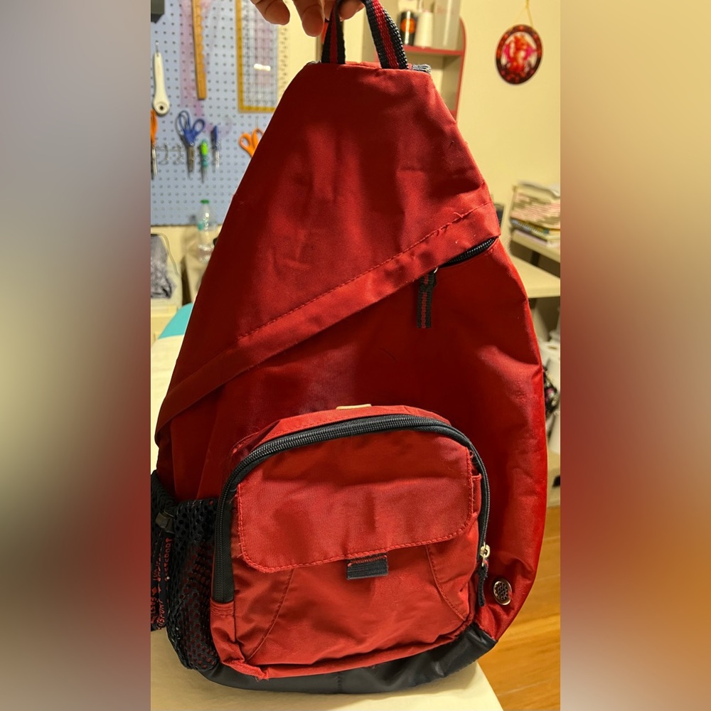 Red And Blue Multi Pocket One Strap Adjustable Back Pack with Side Drink Holder